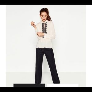 Contrast lace blouse with open neck detail